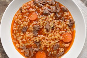 Brodo di carne (beef soup) with farfalline pasta