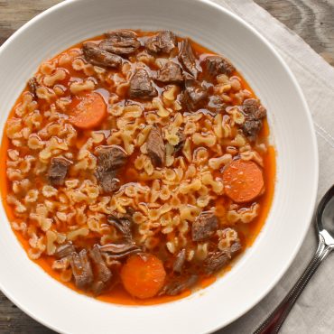 Brodo di carne (beef soup) with farfalline pasta