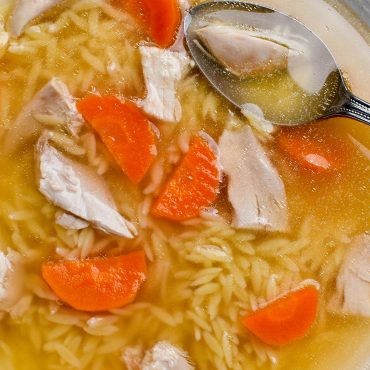 Brodo di pollo (chicken soup) with Risoni pasta