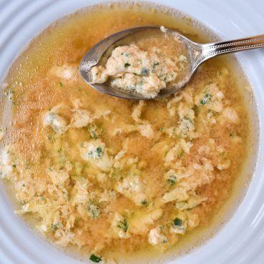 Chicken soup and ‘stracciatella alla Romana’ (Roman-style egg soup)