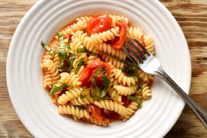 Fusilli pasta 'con pomodorini e basilico' (with cherry tomatoes and basil)