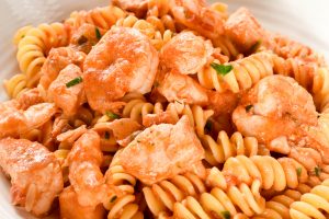 Fussili pasta with salmon and baby prawns (shrimp)