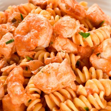 Fusilli pasta with salmon and baby prawns (shrimp)