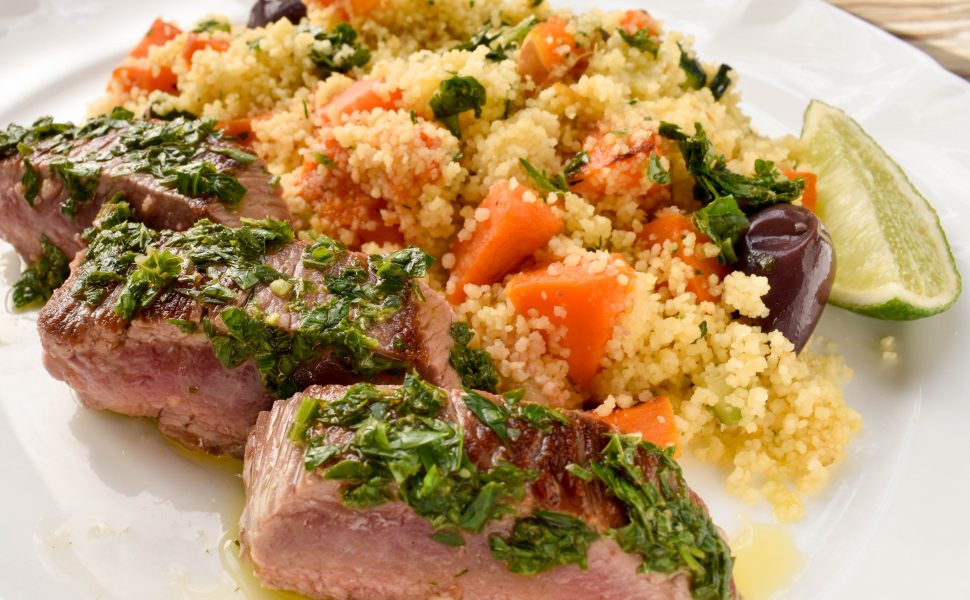 Herbed lamb backstraps with roast vegetable couscous