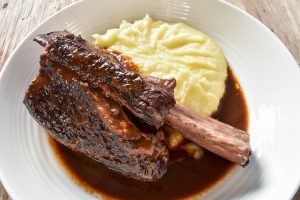 Slow cooked beef short ribs in red wine sauce