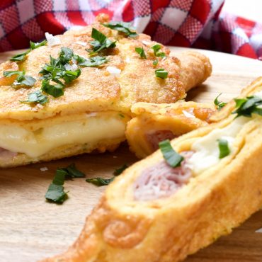 Frittata (rolled omelette) of ham and mozzarella