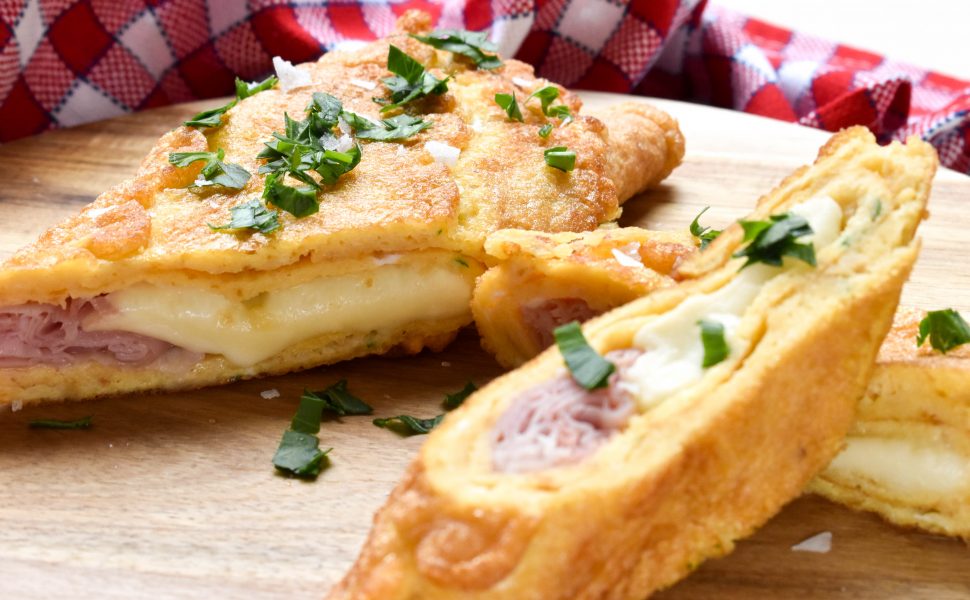 Frittata (rolled omelette) of ham and mozzarella