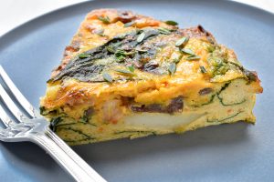 Creamed pumpkin, potato and baby spinach frittata