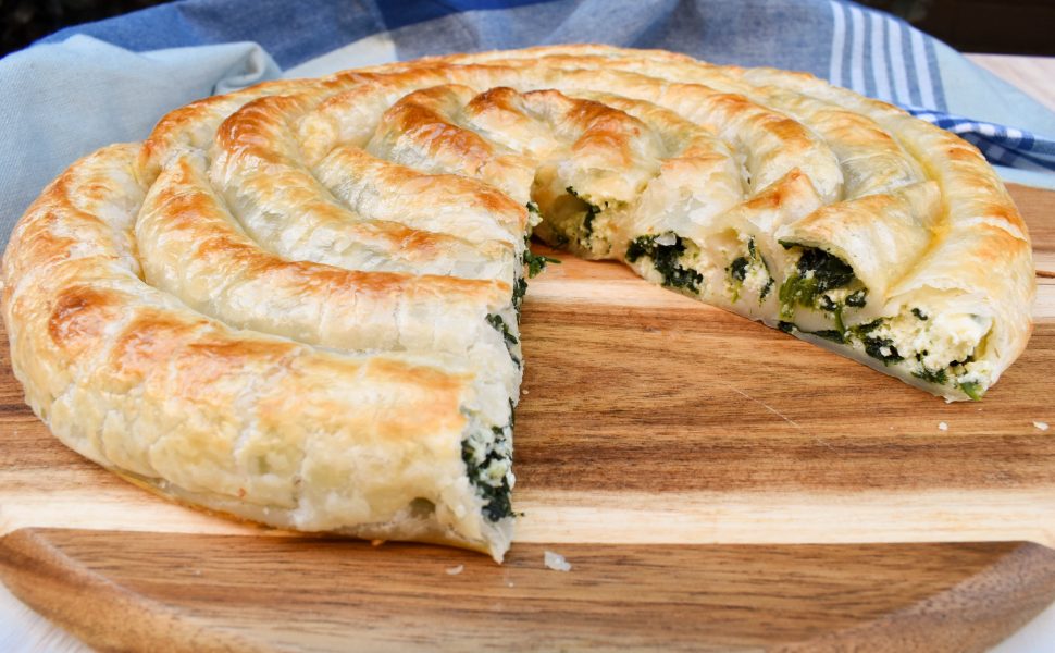 Rolled puff pastry with spinach and ricotta filling