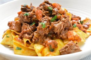 Pappardelle pasta with slow-cooked beef and porcini ragù