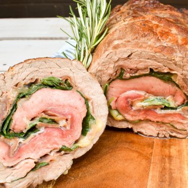 Rolled Beef Roast filled with prosciutto, mozzarella and spinach.