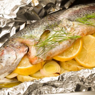 Baked rainbow trout with fennel, lemon and capers