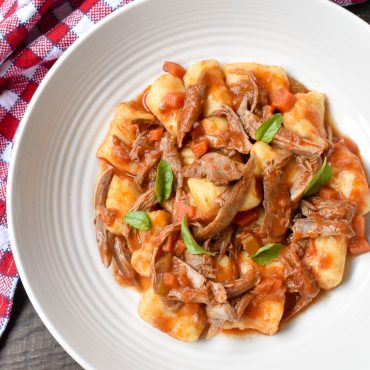 Potato gnocchi with duck and porcini ragu’